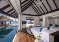 naladhu private island maldives ocean house bedroom interior with pool and deck view 1 - FACES.ch